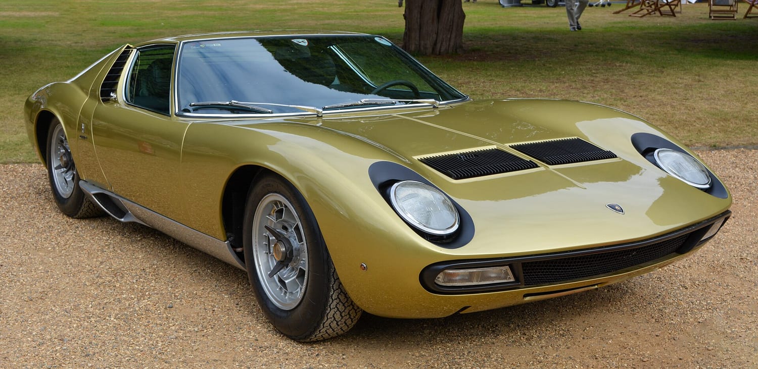 Gold 1971 Lamborghini Miura P400 SV at a concours