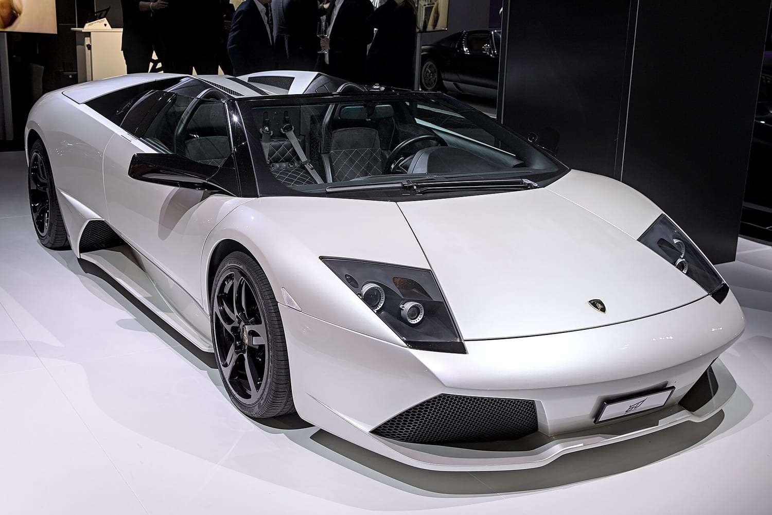 White Lamborghini Murcielago LP640 Roadster in a showroom