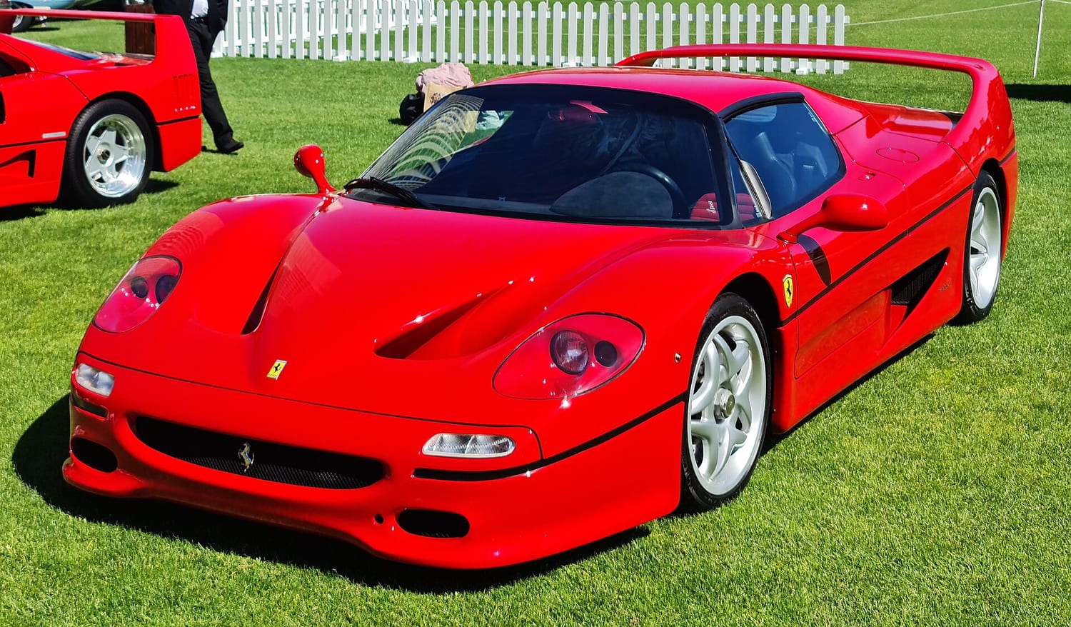 Red Ferrari F50 at a concours